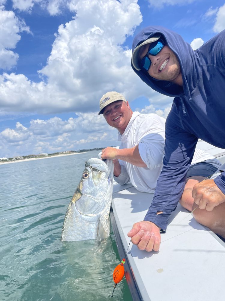 Tarpon released alongside the skiff
